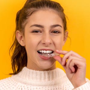 How Does Invisalign for Teens Differ From Adult Invisalign?