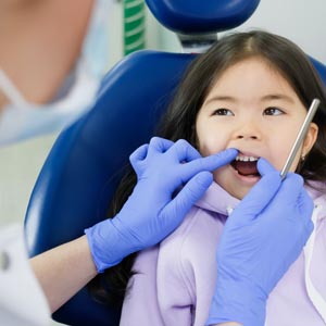 Importance of visiting kid's dentist in Summer