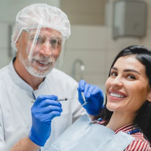 Patient smiling during a consultation with a dentist for cosmetic dentistry in Annapolis